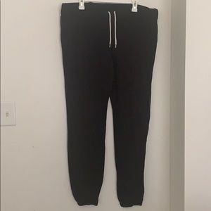 A pair of black mossimo supply co. sweat pants.